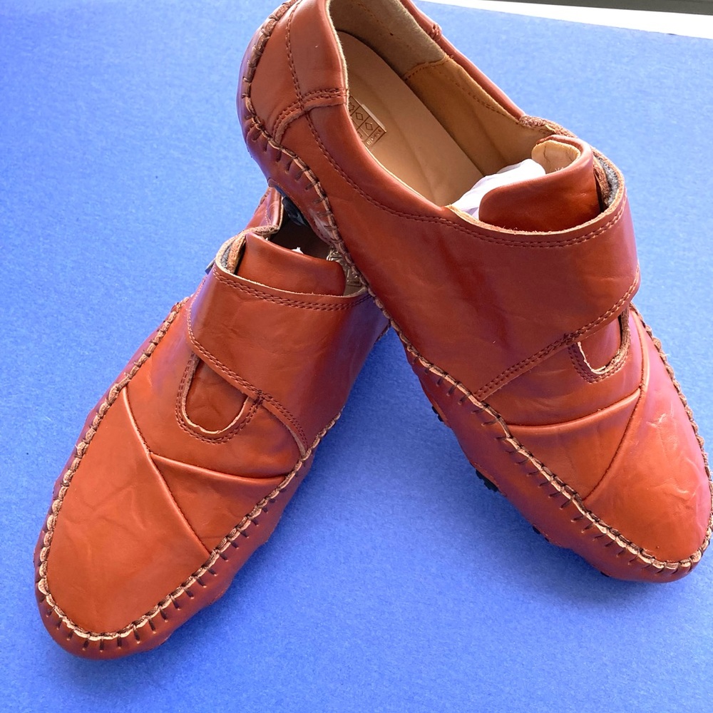 Brand new leather drivers size 10.5. Beautiful cognac color